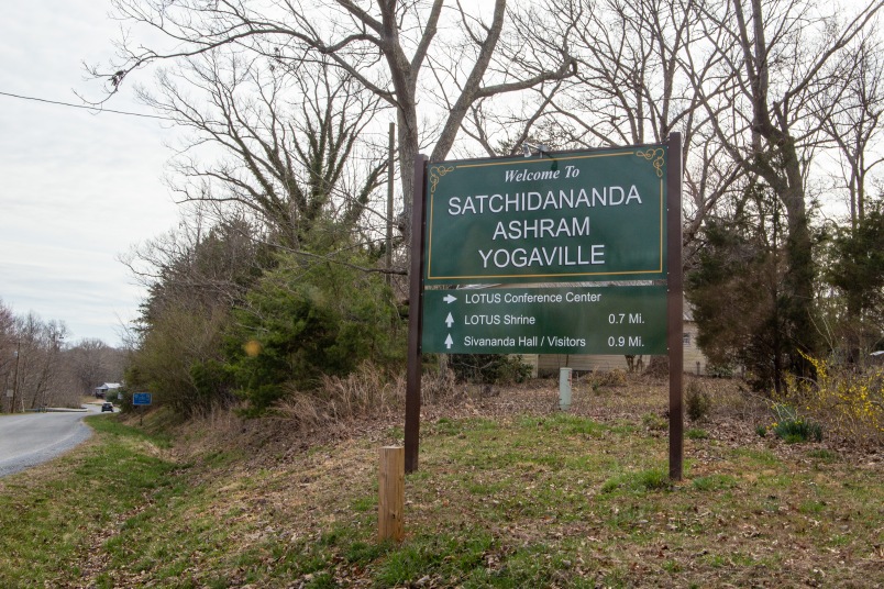 A sign marks the entrance to Yogaville in Buckingham, Virginia.
